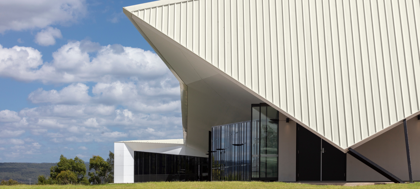 Penrith Anglican College Performing Arts Centre, Orchard Hills, NSW. Features roofing in COLORBOND® steel Surfmist®