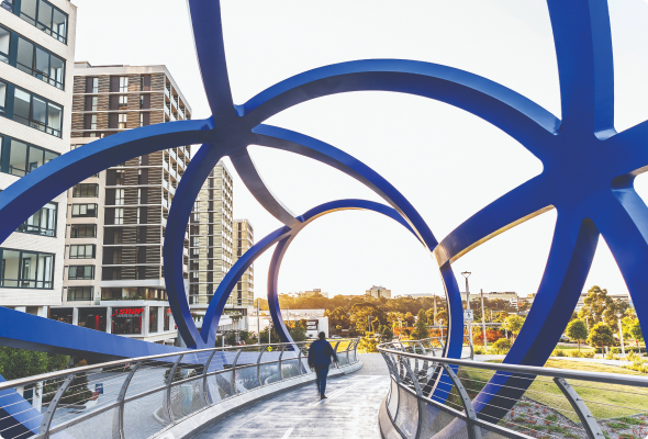 Christopher Cassaniti Bridge, Macquarie Park, Sydney, NSW. Featuring a striking double-helix structure fabricated from XLERPLATE® steel (250 grade).