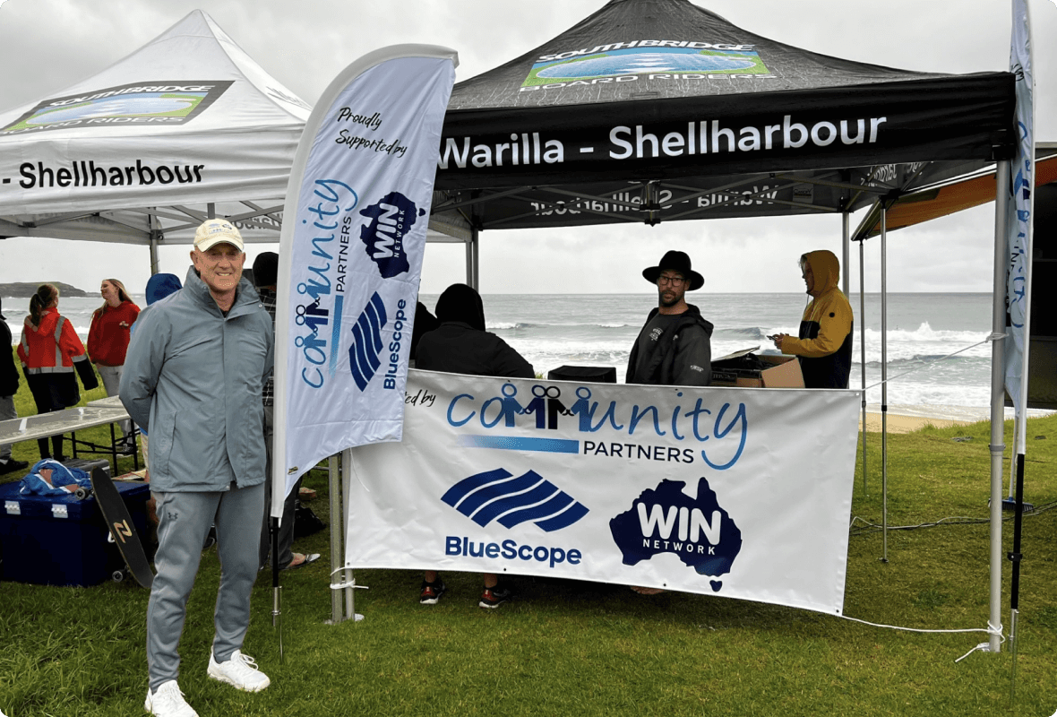 BlueScope staff under a gazebo supporting an event at the beach