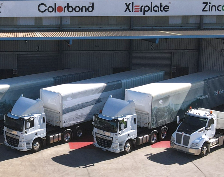 Trucks parked in the loading bay of a BlueScope facility