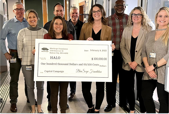 BlueScope staff and board members presenting a donation to The HALO Foundation who will support a new residential center