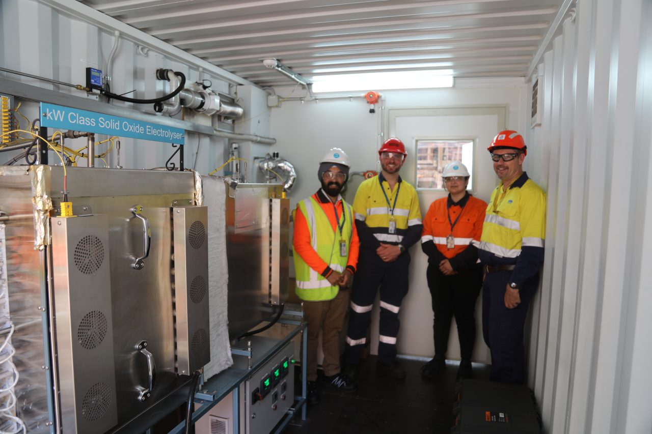 CSIRO-PKSW-Electolyser-pilot-people-with-electolyser