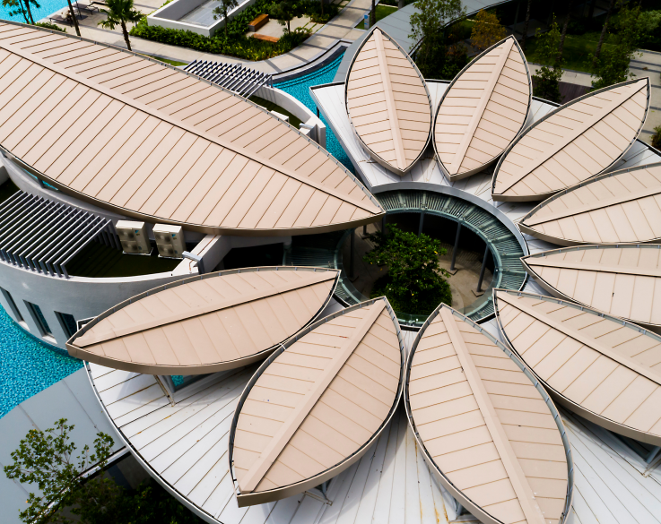 Drone photograph of a modern building with a segmented roof